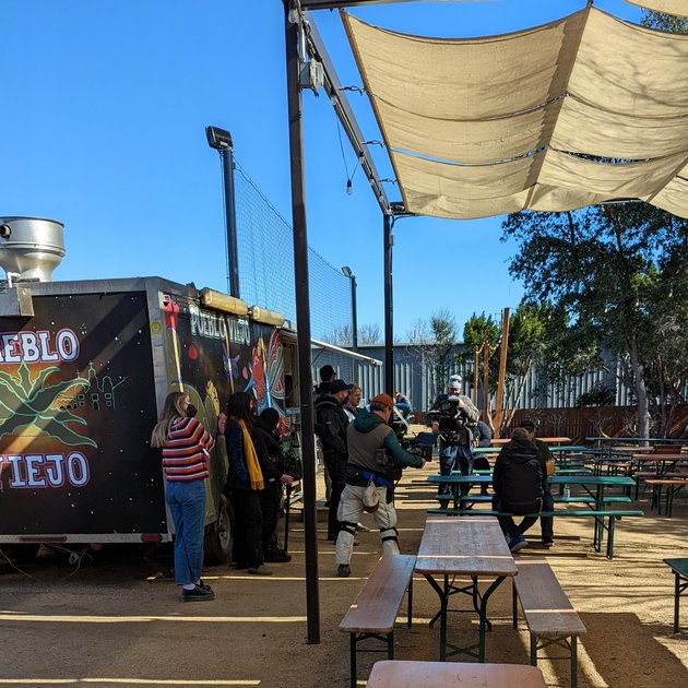 Phil's back is to me